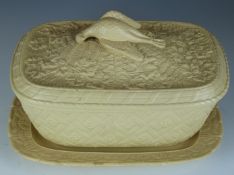 Stoneware covered dish and underplate with impressed anchor mark, the lid with game bird finial,