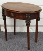 A mahogany oval side table with moulded decoration, W57 x D40 x H50cm