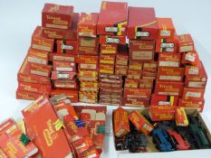 A large collection of Tri-ang and Hornby 00 gauge buildings and accessories including, turntables,
