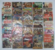 Thirty-four Dell and Gold Key TV, film and Western related comic books including John Wayne, Kirk