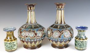 Two pairs of Doulton Lambeth vases with incised signatures, the tallest pair H24cm