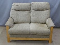 Two two seat sofas with light oak or similar frames, W128cm