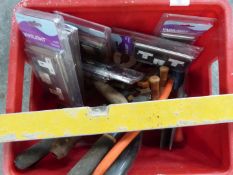 A collection of tools and hardware including brace and bit