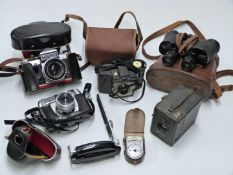 Collectable cameras to include Zeiss Ikon Box Tengor, 1943 6x30 M3 military binoculars in case,