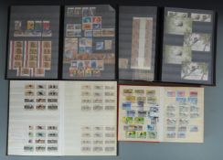 A large quantity of mint Australian stamps - singles, blocks and mini sheets, together with two