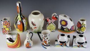 A collection of Lorna Bailey vases, jugs and bookends in various patterns including Highfield,