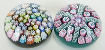Two Peter McDougal glass millefiori paperweights one with latticinio tubes, each 45mm in diameter,