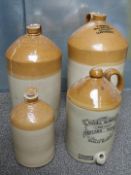 Four stoneware flagons with impressed and painted marks for Alfred Kendall, Worcester, 32cm, G