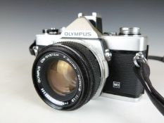 Olympus OM1n SLR camera with 50mm 1:1.8 lens