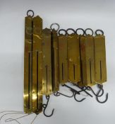 Nine Salter spring balances comprising two 64 dram, No2 75lb, GPO marked 60lb, 25lb, 10 kilo, No.