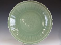 Chinese Longquan Ming dynasty Celadon glazed charger / large dish with incised lotus flower and
