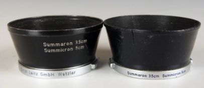 Two Leitz Summaron 3.5cm Summicron 5cm camera lens hoods to suit Leica cameras