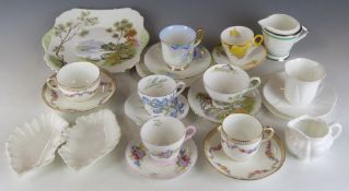 A quantity of mainly Shelley tea ware including Art Deco jug, English Lakes & Blue Iris patterns,