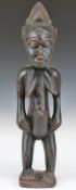 African tribal Bamana carved fertility figure with patination to raised surfaces and beaded