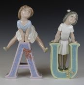 Two Lladro figures 'A' and 'U'