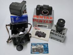 Pentax SF7 SLR camera with 28-80mm 1:3.5-4.5 lens, both in boxes, Zenit-E with Helios 44-2 lens