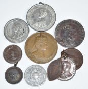 A collection of bronze and other commemorative medallion coins to include Queen Victoria, Edward
