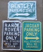 Three metal advertising signs to include Bentley, Range Rover & Jaguar, each approximately 35.5 x