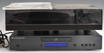 Rega P3 turntable and a Cambridge Audio Topaz CD player, with instruction booklets