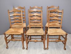 Set of six rush seated oak Arts and Crafts ladderback chairs