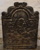 Cast iron fire back with figural decoration, W51 x H74cm