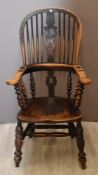 19thC elm seated Windsor chair with pierced back splat and shaped armrests, H130cm
