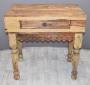 Eastern hardwood side table with single frieze drawer, raised on reeded legs, W99 x D67 x H96cm