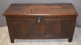 18th/19thC carved oak trunk with flower decoration, W154 x D54 x H68cm