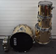 Remo Qudura drum kit comprising 22 inch bass drum, 16 inch floor tom, 13 inch tom and 12 inch tom