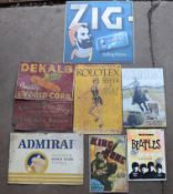 Eight advertising signs to include The Beatles, Zig-Zag, Kolotex, Dekalb etc, largest 61 x 61cm