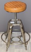 Leather topped and metal adjustable height industrial style stool