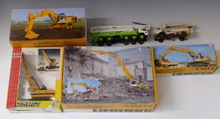 Six Joal, Liebherr and similar diecast model construction vehicles, all in original boxes.