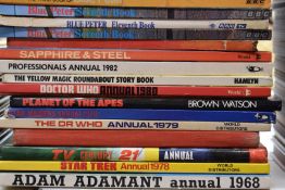 Forty-three TV related books and annuals including Blue Peter, Planet of the Apes, Dr Who, Magic