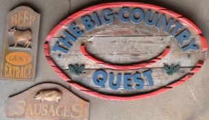 The Big Country Quest wooden sign together with wooden beef extract and sausages signs, largest 72 x