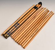 A collection of drumsticks including Cozy Powell and Dean Markley branded examples and a pair signed