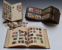 Two early albums of all-world stamps, loose stamps and a cigarette card album including horse racing