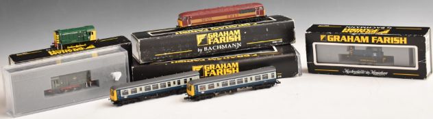 Six Graham Farish N gauge model railway diesel locomotives including Class 108 DMU two-car set, EW&S