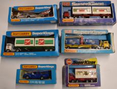 Six Matchbox SuperKings diecast model vehicles including Motorcycle Racing Set, Container Truck,