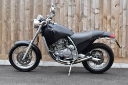 1997 Aprilia Moto 6.5 motorcycle designed by Philippe Starck, registration number P810 WBH, with V5c