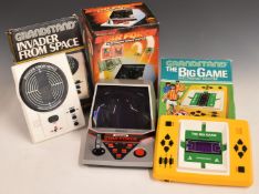 Three vintage Grandstand video games consoles, Star Force, Invader From Space and The Big Game