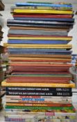 Over 40 books and annuals including Rupert, Space 1999, Gerry Anderson Thunderbirds etc.