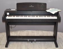 Yamaha Clavina CLP-152S electric piano with booklets