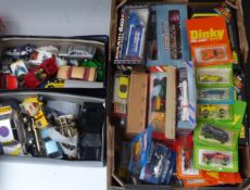 A collection of Dinky, Matchbox, Burago and other diecast model vehicles including Dinky 412 Bedford