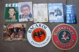 Eight metal advertising signs to include Budweiser, Cadbury, beer, Bacardi etc, largest 50.5cm