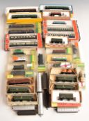 Seventeen Hornby Minitrix, Piko and similar N gauge model railway passenger coaches, most in