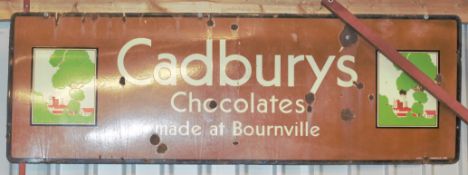 Vintage enamel advertising sign 'Cadbury's Chocolates made at Bournville', 61 x 183cm PLEASE NOTE
