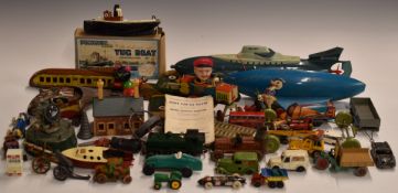 A collection of diecast and tinplate model vehicles including Penguin Tug Boat, Corgi, Dinky, Tri-