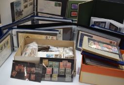 An album of mint Christmas stamps of Great Britain 1966-1979, several Jersey/Guernsey stockbooks,