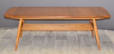 Ercol retro light elm coffee table with undershelf, W103 x D43 x H46cm