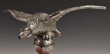 Desmo or similar vintage car mascot formed as bird on ball, width 17.5cm